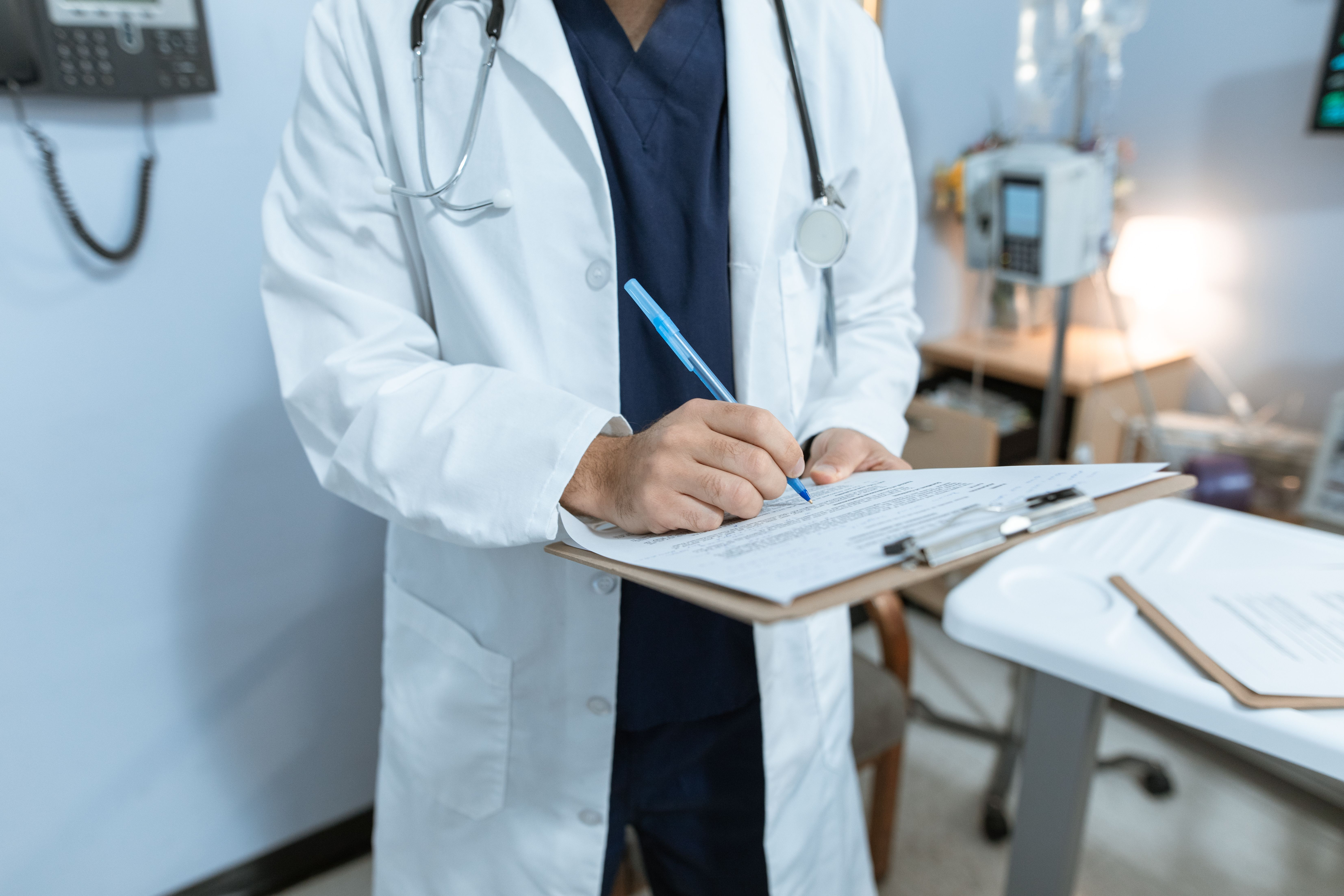 Professional Asian doctor in a white coat